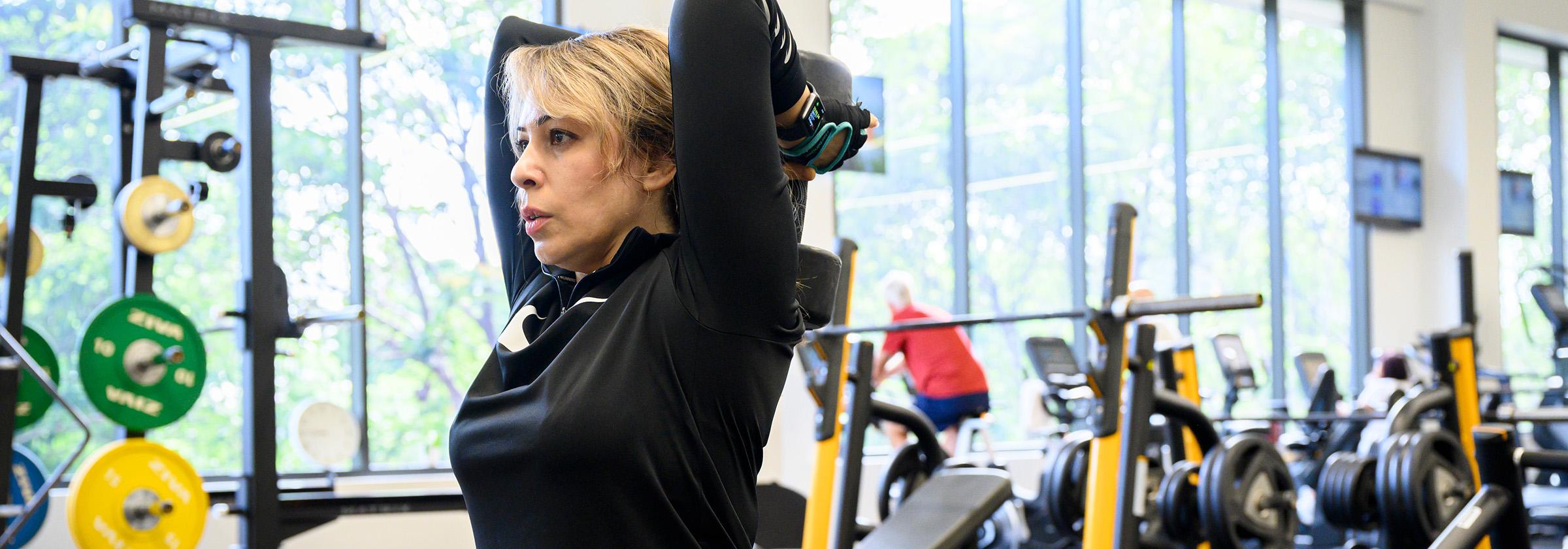 Image of personal trainer doing a gym exercise