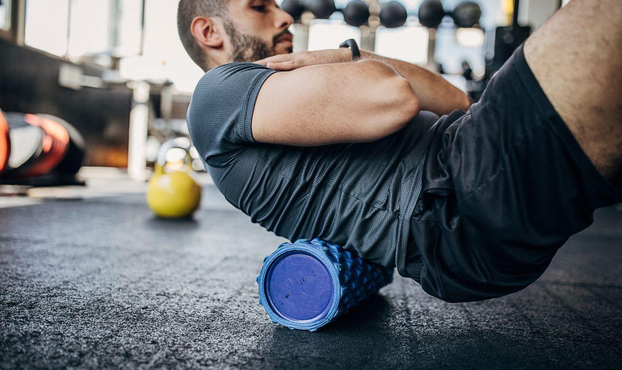 Person using foam roller on back