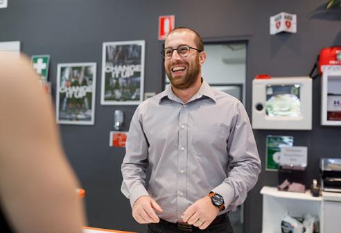 Staff member behind desk 