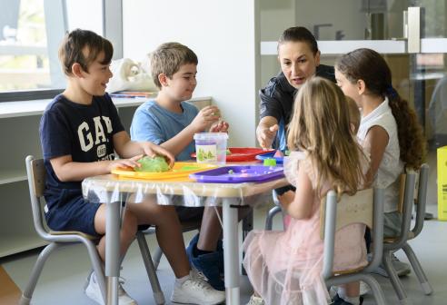 children around table